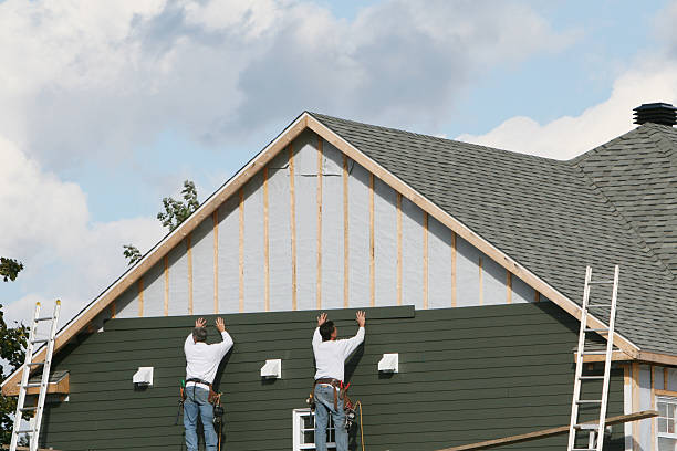 Professional Siding Installation technician working in Adamsville, OH